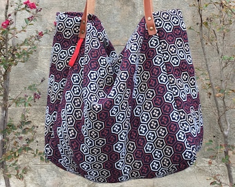 Bolso bandolera grande, hecho de tela con 2 tiras de cuero