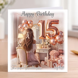 May include: A birthday card with the text "Happy Birthday" and a large "15" made of rose gold balloons. The card shows a person at a dressing table, with balloons, gifts, and the name "Sophie". The card also includes the text "To a special Granddaughter".
