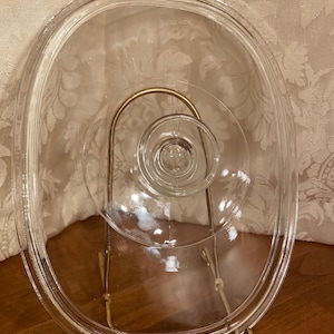 Pyrex/ Corning #F12 rectangular lid with knob handle, the interior measurement of the flange is 8 1/2” x 6 1/2” or 22.5cm x 17cm