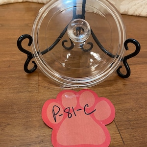 Pyrex 6” round #P 81 with knob handle, flange measurement, 5 3/4”