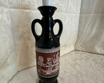 MCM Jim Beam 1962 Egyptian style “Cleopatra and Marc Antony” on a black milk glass empty decanter