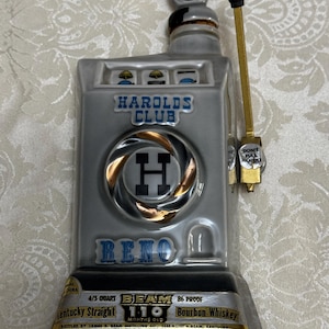 Jim Beam 1968 Harold’s Club Reno Slot Machine decanter, about 10.5” tall