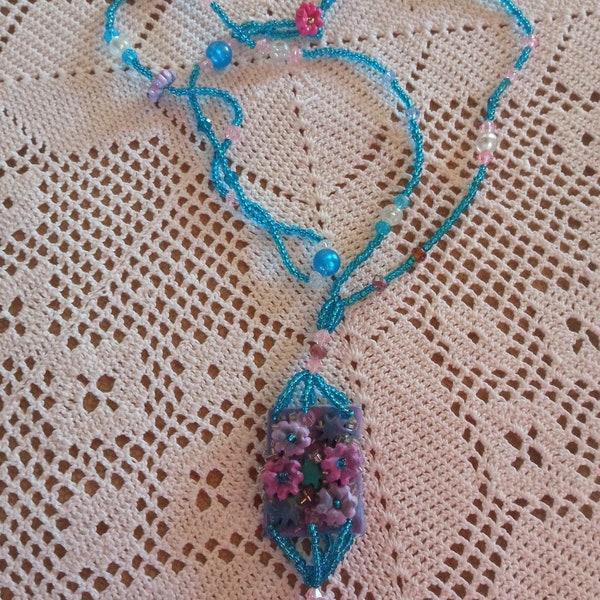 Long blue beaded polymer clay necklace pendant