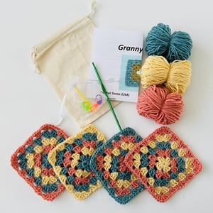 May include: A crochet kit with instructions, yarn in teal, yellow, and coral, a crochet hook, stitch markers, and a drawstring bag. The kit includes four completed granny squares in the same colors.