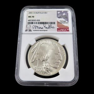 May include: A silver 2001 Buffalo nickel graded MS 70, encased in a protective holder. The coin features a Native American profile and the word "LIBERTY". The holder includes the signature of Miro Castle and the text "Authentic Hand-Signed".