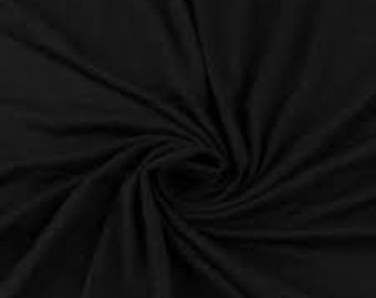 May include: Black fabric with a smooth, soft texture. The fabric is tightly woven and has a slight sheen.