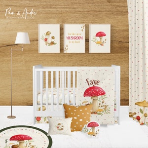 May include: A nursery room decorated with a mushroom theme. The crib has a white sheet and a mushroom-themed blanket with the name "Faye" on it. There are three framed prints with mushroom illustrations and the text "You take up so mushroom in my heart". There is a round rug with a mushroom illustration and the text "F".