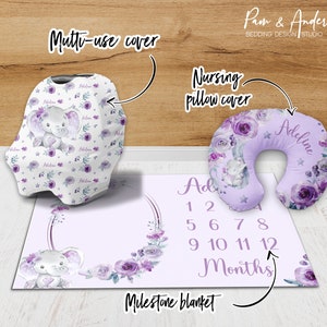 May include: A purple and white milestone blanket with a floral design and a cute elephant illustration. The blanket also includes a number chart for tracking a baby's growth. The set also includes a matching nursing pillow cover and a multi-use cover.