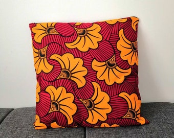 Housse de coussin wax - Fleur jaune orangé sur rouge