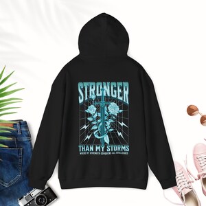 CPTSD Stronger Than My Storm Hoodie Essential Hoodie Hidden Disability Shield of God Hoodie audhd Mentalhealth Hoodie Substance Abuse Shirt