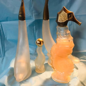 Lot of 4 Vintage Avon Bottles