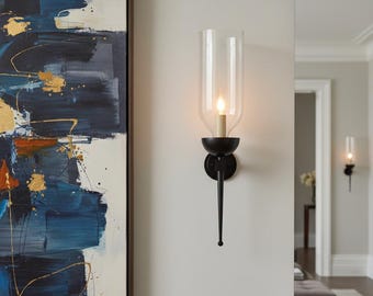 The Cubic Hurricane wall Sconce in Bronze