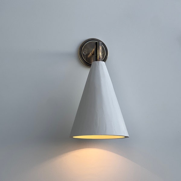 Antique brass and plaster cone wall light