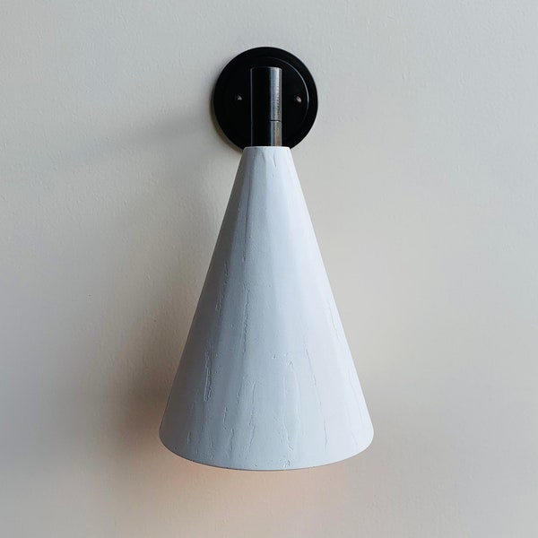 Bronze and plaster cone wall light