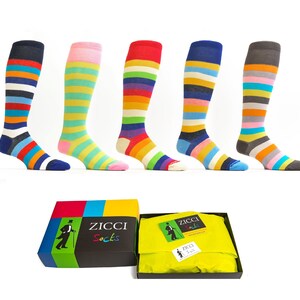 May include: Five pairs of colorful striped knee-high socks in a box labeled "Zicci Socks".