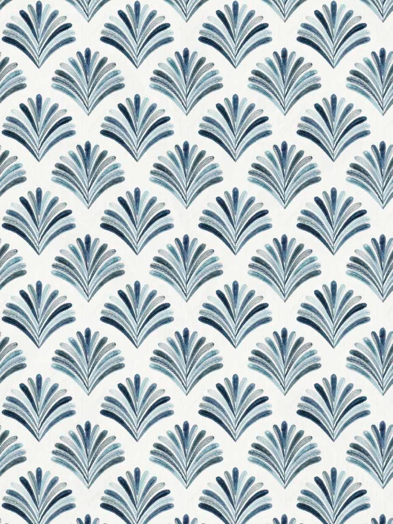 May include: A seamless pattern featuring a repeating design of stylized blue and teal fan shapes on a white background.