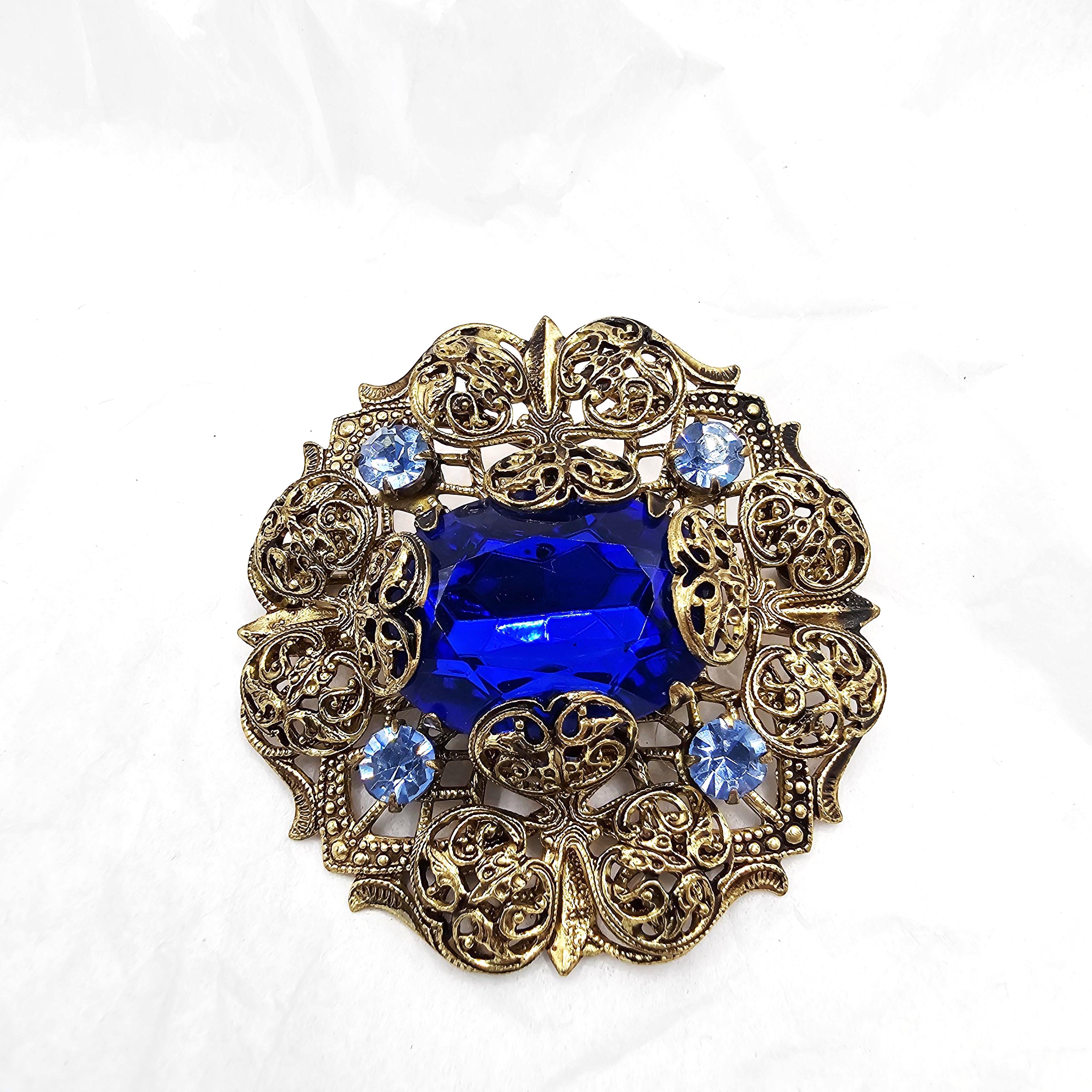 Beautiful Vintage Filigree and Blue Rhinestone Brooch, Burnished Gold-Tone Pin with Large Royal Blue Center Stone, Jewelry Accessory