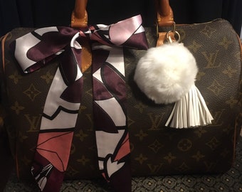 plum coach purse
