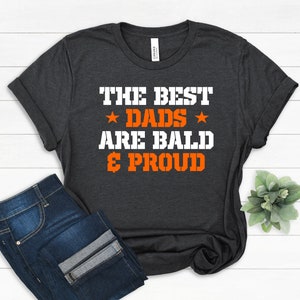 Best Dads are Bald and Proud, Funny T-Shirt for Bald Dads, Perfect Gift Idea for Husband, Grandpa, Uncle, Brother on Father&#39;s Day T-shirt