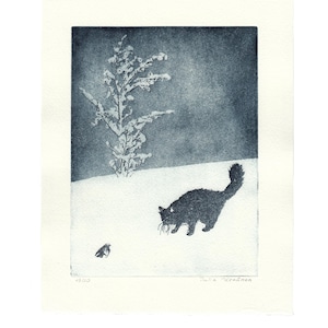 May include: A dark blue and white etching print on paper featuring a black cat walking through snow towards a small bird. A snow-covered tree stands in the background against a dark sky. The print is signed and numbered 15/20 at the bottom.