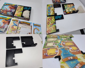 May include: A board game called "Draftsaurus" with a colorful game board, game pieces, and instructions. The game is about drafting dinosaurs and building a prehistoric park.