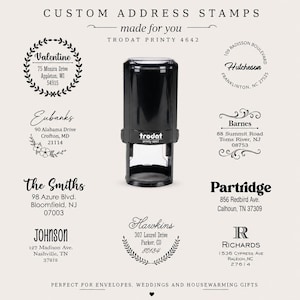 May include: A black Trodat Printy 4642 self-inking stamp centered among various examples of custom address stamp imprints. The text includes CUSTOM ADDRESS STAMPS, made for you, and several sample names and addresses like Valentine, Eubanks, and Smiths.