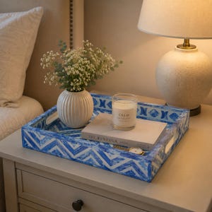blue bone inlay tray, chevron serving tray, geometric tray, blue and white tray, decorative tray, handmade serving tray, coffee table tray, ottoman tray, luxury tray decor, modern vanity tray, artisan inlay tray, chic home decor, resin tray, contemporary serving tray, statement tray, handcrafted decor tray, coastal home decor, boho serving tray, stylish organizer tray, elegant tabletop decor