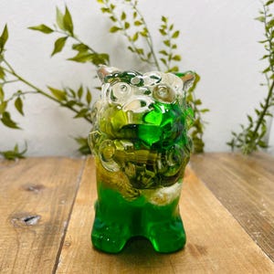 Unterwasserblumen-Schaltknauf, Shisa, grünes Blumenfeld