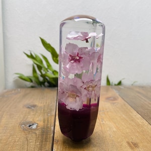 Perilla de cambio con diseño de flor subacuática, flor de cerezo, color morado