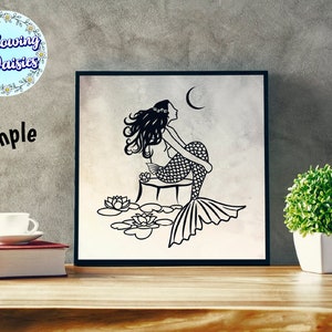 May include: Black and white illustration of a mermaid sitting on a tree stump with a crescent moon in the background. The mermaid has long flowing hair and a tail with scales. There are water lilies around the stump.