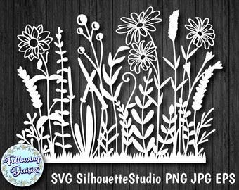 May include: White silhouette of a field of flowers and grasses. The flowers are daisies and the grasses are various types. The image is on a dark wood background. The text "SVG Silhouette Studio PNG JPG EPS" is at the bottom of the image.