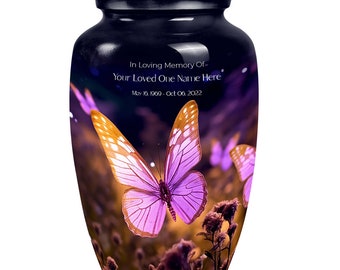 May include: Purple and orange butterfly cremation urn with a dark blue background. The urn has the text "In Loving Memory Of Your Loved One Name Here May 16, 1969 - Oct 06, 2022"
