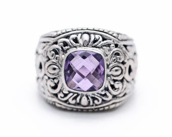 Handgemaakte ring met hemelsblauwe topaas en amethist: Balinese sterlingzilveren sieraden