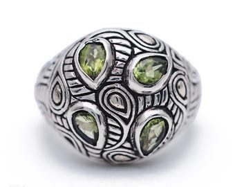Handgemaakte Balinese sterlingzilveren koepelring: peridot en granaat