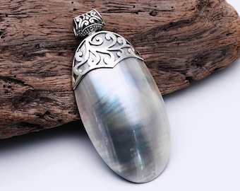 Sterlingzilveren nautilusschelphanger: op de oceaan geïnspireerde sieraden