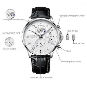 May include: A silver-toned men's wristwatch with a white face and black leather band. The watch features a chronograph function, a date window, and a luminous watch hand. The watch face also includes the text "MINUTESTRY 30M WATER" and "SWISS DESIGN".
