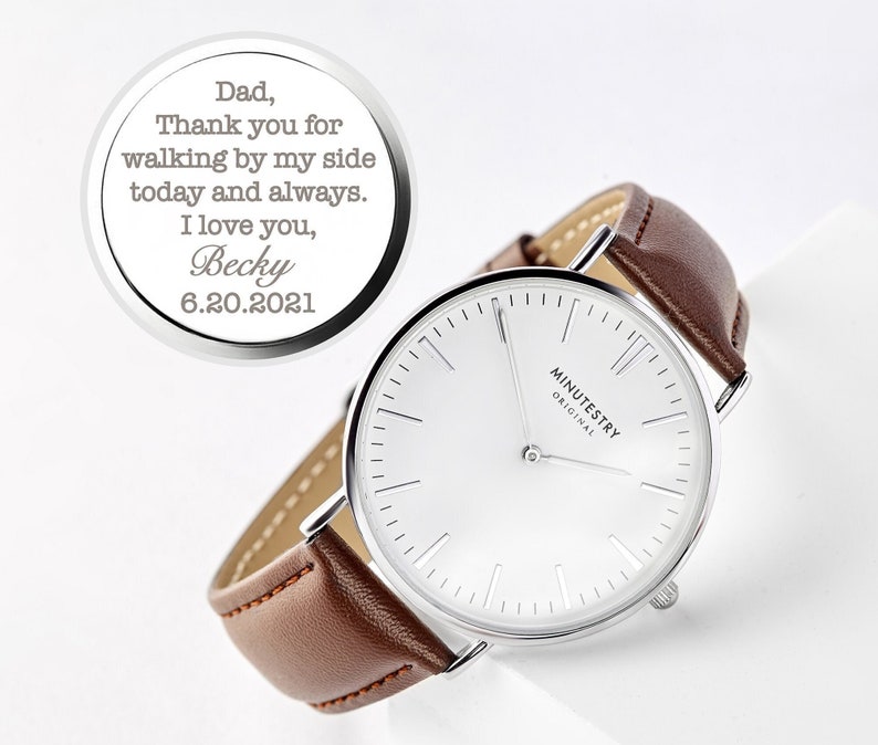 Personalized wristwatch with brown leather strap, featuring a custom engraving on the back. Engraving reads: Dad, Thank you for walking by my side today and always. I love you, Becky 6.20.2021.