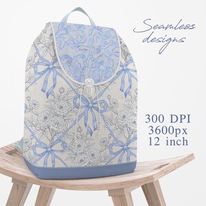 May include: A blue and white backpack with a floral and bow pattern. The backpack is 12 inches wide and has a 300 DPI resolution.