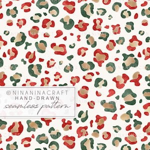 May include: A seamless pattern featuring a repeating leopard print design. The pattern includes red, green, and tan spots on a cream background. The text "NINANINACRAFT HAND-DRAWN seamless pattern" is in a white rectangle at the bottom.