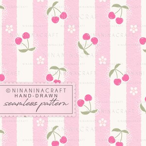 May include: A seamless pattern featuring vertical stripes in alternating shades of light pink and off-white, decorated with small pink cherries and white flowers. A rectangular label with scalloped edges displays the text NINANINACRAFT HAND-DRAWN seamless pattern.