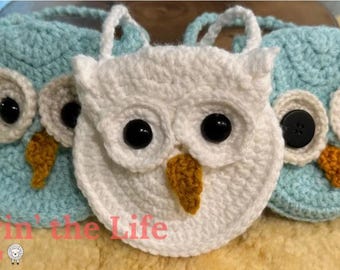 May include: Three crocheted owl purses, one white, one light blue, and one teal blue. Each purse has black button eyes and a yellow beak.