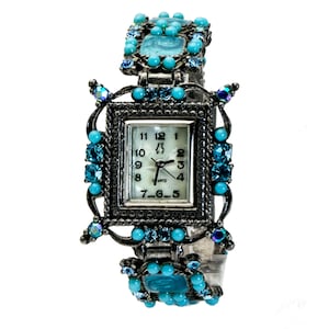 Reloj de bronce antiguo con piedras de color turquesa y correa de eslabones para mujer