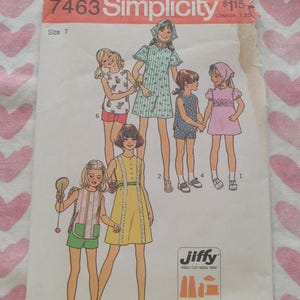 May include: Vintage Simplicity sewing pattern 7463 featuring illustrations of children's clothing designs. The pattern includes a variety of dresses, shorts, and tops. The package has the text "Jiffy easy cut-easy sew".