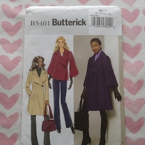 May include: A Butterick B5401 sewing pattern envelope for sizes 8-10-12-14. The front displays illustrations of three coat variations: a beige knee-length coat, a red cropped jacket with wide sleeves, and a purple knee-length coat with wide sleeves.