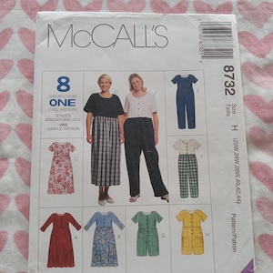 May include: A McCall's sewing pattern envelope featuring illustrations of eight different garment designs. The envelope includes the text "McCall's", "8 Great Looks One Easy Pattern", and size information. The pattern includes dresses, jumpsuits, and a top and pants set.