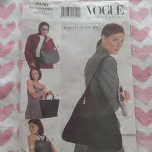 May include: Vogue Accessories sewing pattern featuring various bag designs. The pattern includes images of a tote bag, a shoulder bag, and a backpack. The cover has the text "Vogue Accessories" and "Margot Hotchkiss".