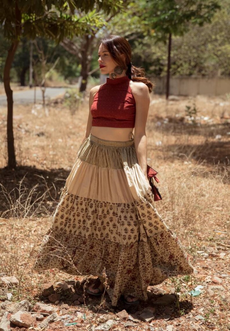 Hand block print ajrakh multi tiered skirt and crop top set made using natural dyes