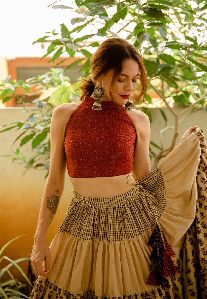 Hand block print ajrakh multi tiered skirt and crop top set made using natural dyes