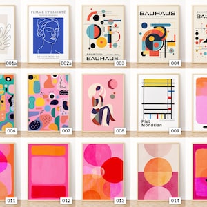 May include: A selection of framed art prints with abstract and Bauhaus-inspired designs. The prints display a range of colours, including blue, pink, orange, and black. Some prints feature text such as "Bauhaus" and "Femme et Liberte".