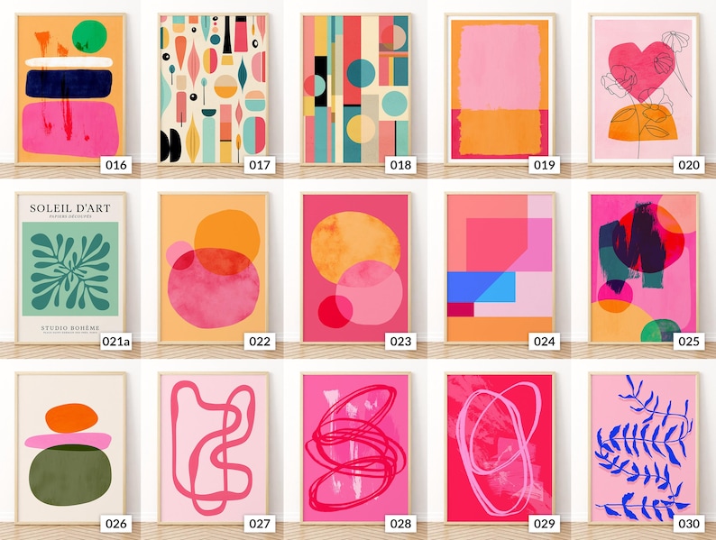 May include: A selection of framed abstract art prints. The prints showcase diverse geometric shapes and organic forms in bright colours such as pink, orange, blue, and green. Each print has a unique design, with some including text.